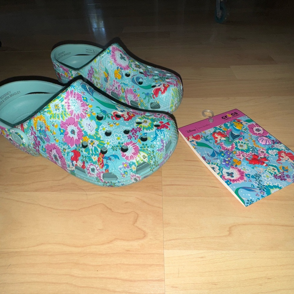 NEW. Retired Disney Vera Bradley Crocs with matching Disney Croc Jibbitz.